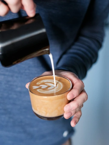 Barista preparing a flat white