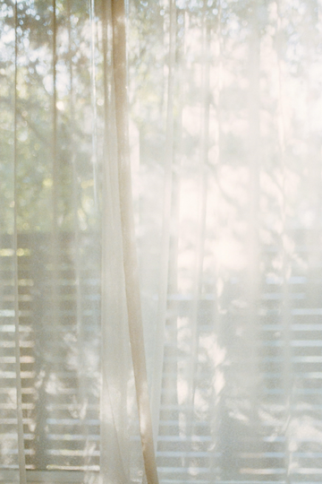 Sunlight pouring through the curtains